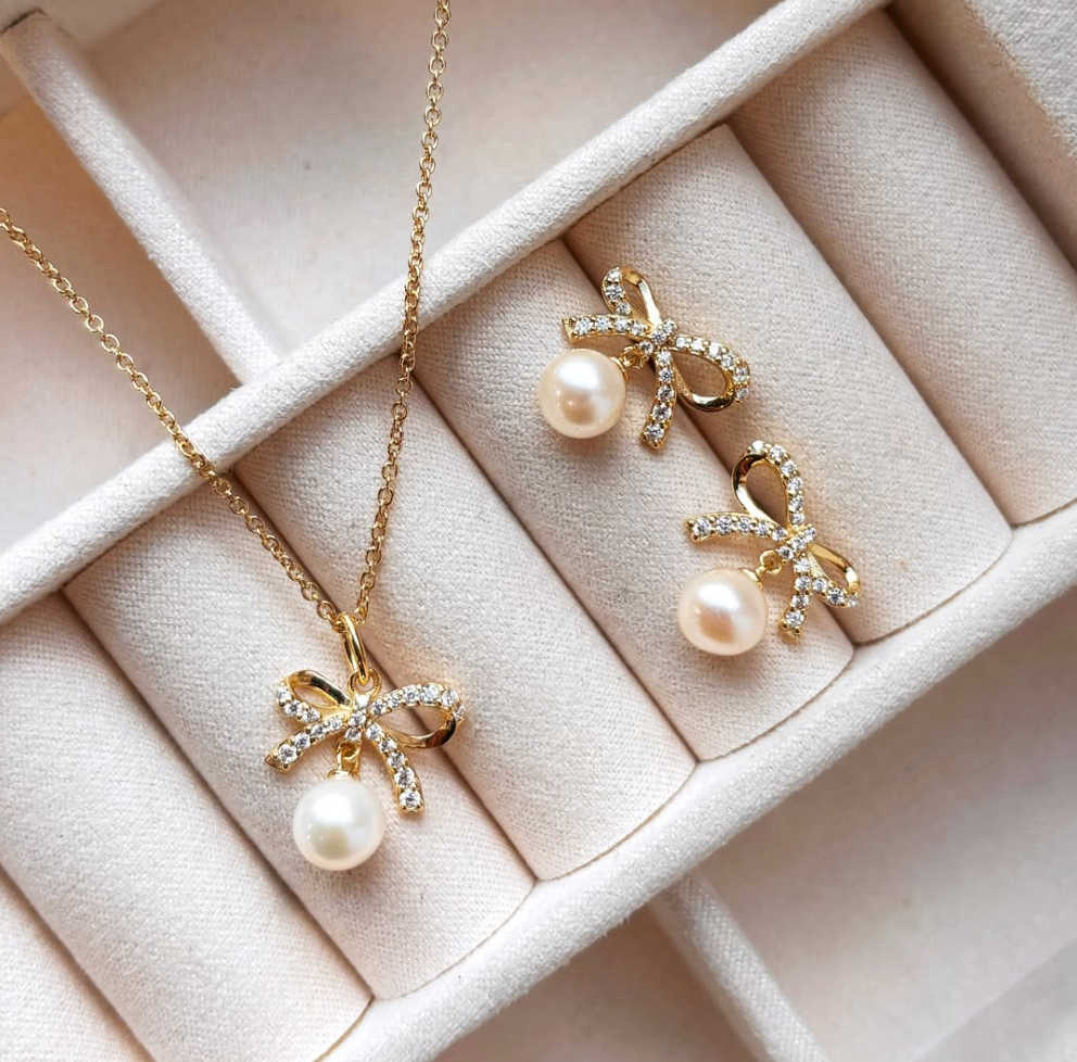 Vedhæng sløjfe fkp./cubic zir. sølv fg. m/kæde